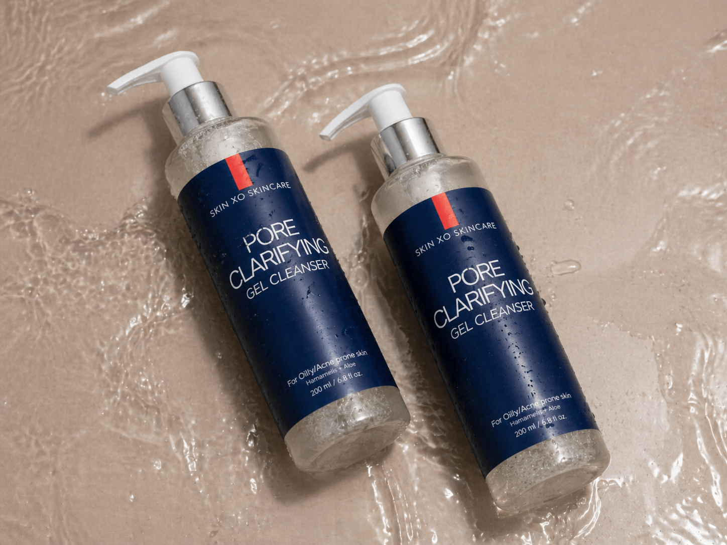 Two bottles of skin xo Pore Clarifying Gel Cleanser on a textured beige background.